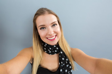 Young woman taking a selfie