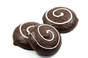 Chocolate cookies with cream filling isolated on white background.