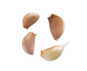 Fresh garlic cloves isolated on white background.