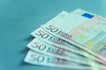 Close up of 50 Euro banknotes - green tone