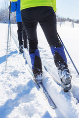 Couple cross country skiing in winter