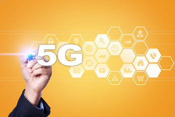 Businessman drawing on virtual screen. 5g concept.