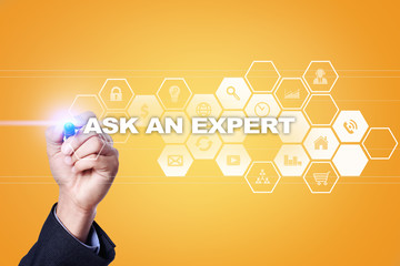 Businessman drawing on virtual screen. ask an expert concept.