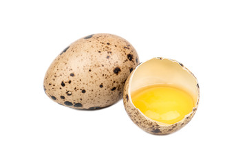 Split quail egg isolated on white background