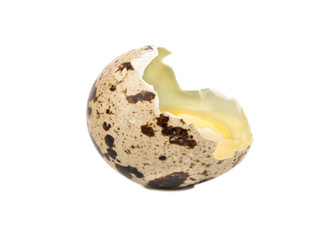 Raw broken quail egg isolated on white background