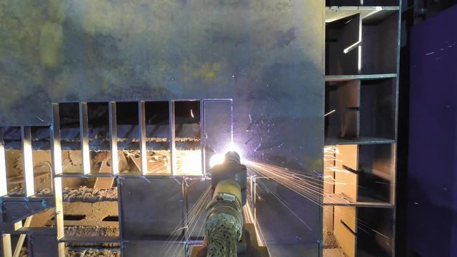 Laser cutting with sparks close up timelapse