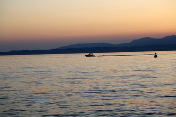 Obraz premium Beautiful sunset at Garda lake in Italy