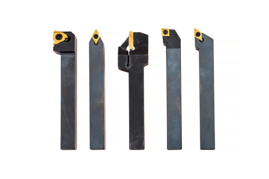 Indexable lathe tools with replaceable tips, series on white background. Inserts can be rotated to a new cutting edge