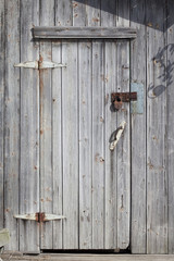 old wooden door with metal latch