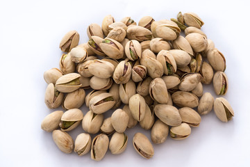 Group of Pistachio nuts on a white background