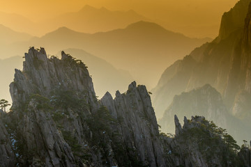 Obraz na płótnie Canvas Landscape of Huangshan (Yellow Mountains). Huangshan Pine trees. Located in Anhui province in eastern China. It is a UNESCO World Heritage Site, and one of China's major tourist destinations.