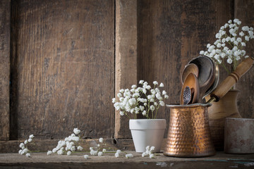 Kitchenware on the old wooden background