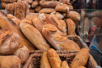 Raisins bread and group of baked goods for sale at Mahane Yehuda Market, popular marketplace in Jerusalem, Israel