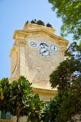 The clock tower in Prince Alfred's Courtyard of Grandmaster's Palace. Valletta. Malta