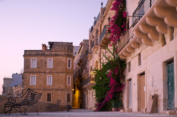 The openwork metal benches on the waterfront of the Senglea, Malta