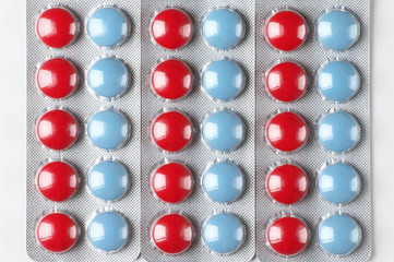 Colorful pills in blisters