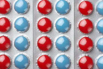 Colorful pills in blisters