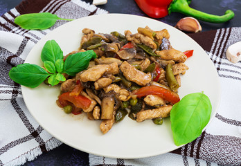 Stir Fry Chicken with peppers and peas on white background