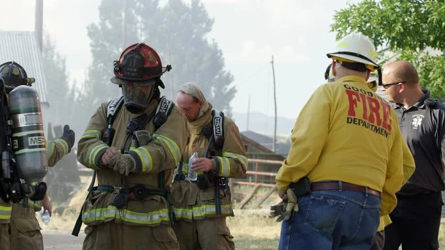 Firemen talking with each other