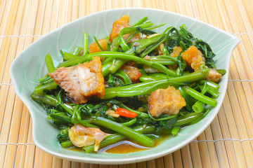 Thai Food Fried Morning Glory with Crispy Pork
