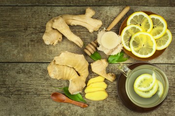 Homemade ginger tea with lemon. Treatment of influenza and colds. Traditional folk medicine.