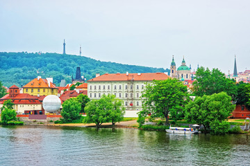Obraz premium Vltava River with Kafka Museum and Old town of Prague