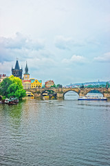 Naklejka premium Water Ferry at Charles Bridge in Prague
