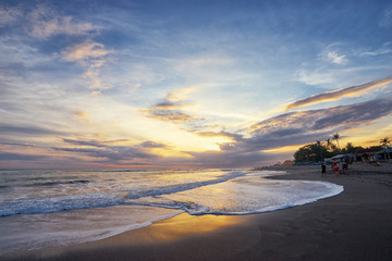 Beautiful landscape. Sunset on the sea shore. Bali, Indonesia.