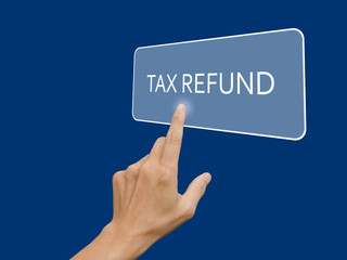 hand touching tax refund button.