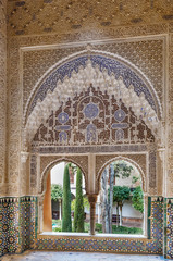 Window with arabesque in Alhambra, Spain