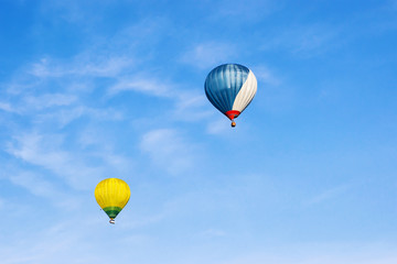 Colorful Air balloons flying high in sky Vilnius