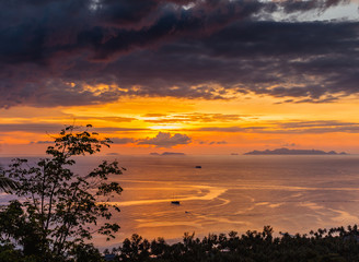 Obraz na płótnie Canvas Sunset on the sea, view from the island