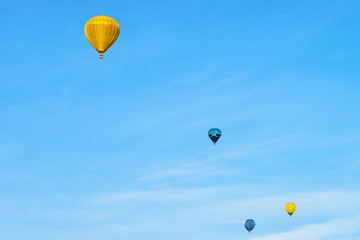 Colorful Air balloons flying high in sky