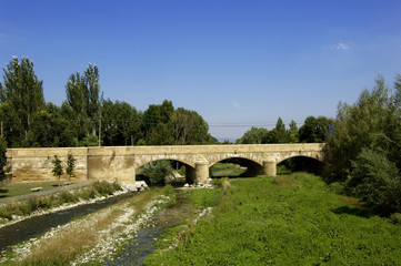 Oja river and medieval bridge of Casalareina, La Rioja, Spain