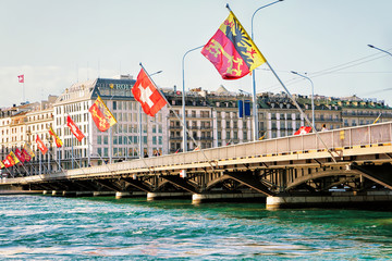 Mont Blanc bridge and Swiss flags over Geneva Lake Geneva