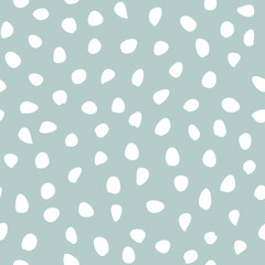 Seamless vector background with random white elements. Abstract ornament. Dotted abstract pattern
