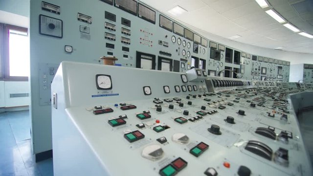  Interior view of system control panel in power plant control room. No people.
