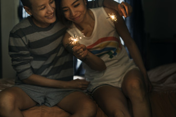 Naklejka na ściany i meble LGBT Lesbian Couple Moments Happiness Concept