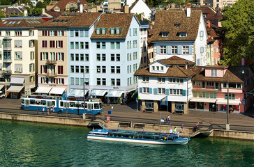 Tram and ferry boat at Limmatquai in city center Zurich Swiss
