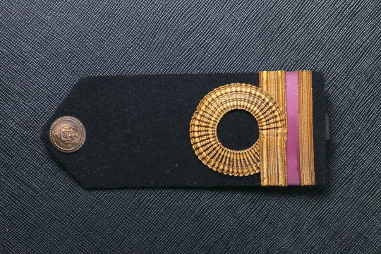 Vintage And Old Royal Thai Navy Arm Made From Velvet Black Color And Gold Color Cloth Well-knit Represent Thai Navy Arm Accessory To Use With Uniform.