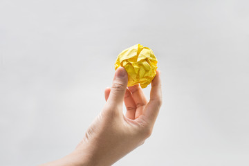 Paper crumpled ball on hand.Idea concepts