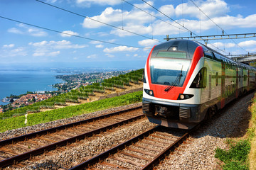 Train at Lavaux Vineyard Terraces at Lake Geneva Swiss mountains