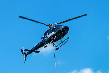 Helicopter flying in sky in Lavaux Switzerland