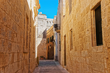 Street with lantern and balcony in Mdina