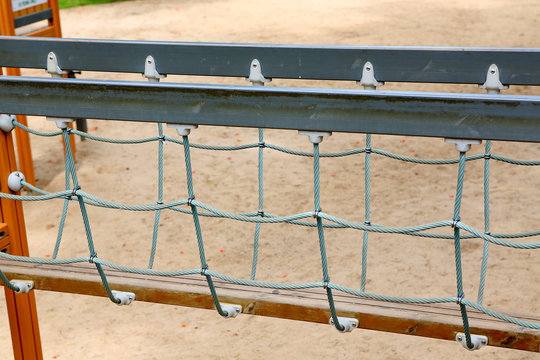 Walk bridge with side rope protection on handrails