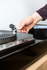 Putting the needle on a vinyl record