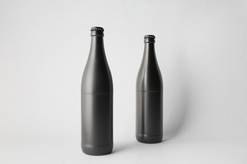 Two beer bottles on the scene, mock-up.