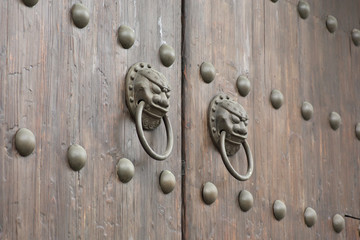 chinese antique doors with lions knocker