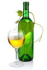 Glass and bottle with white wine and grapevine isolated on white backgound