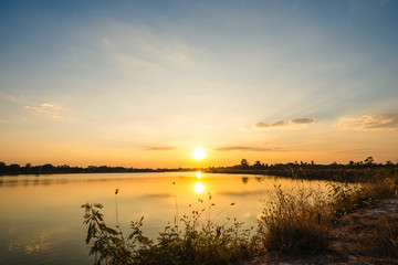 Naklejka premium sunset on the lake landscape